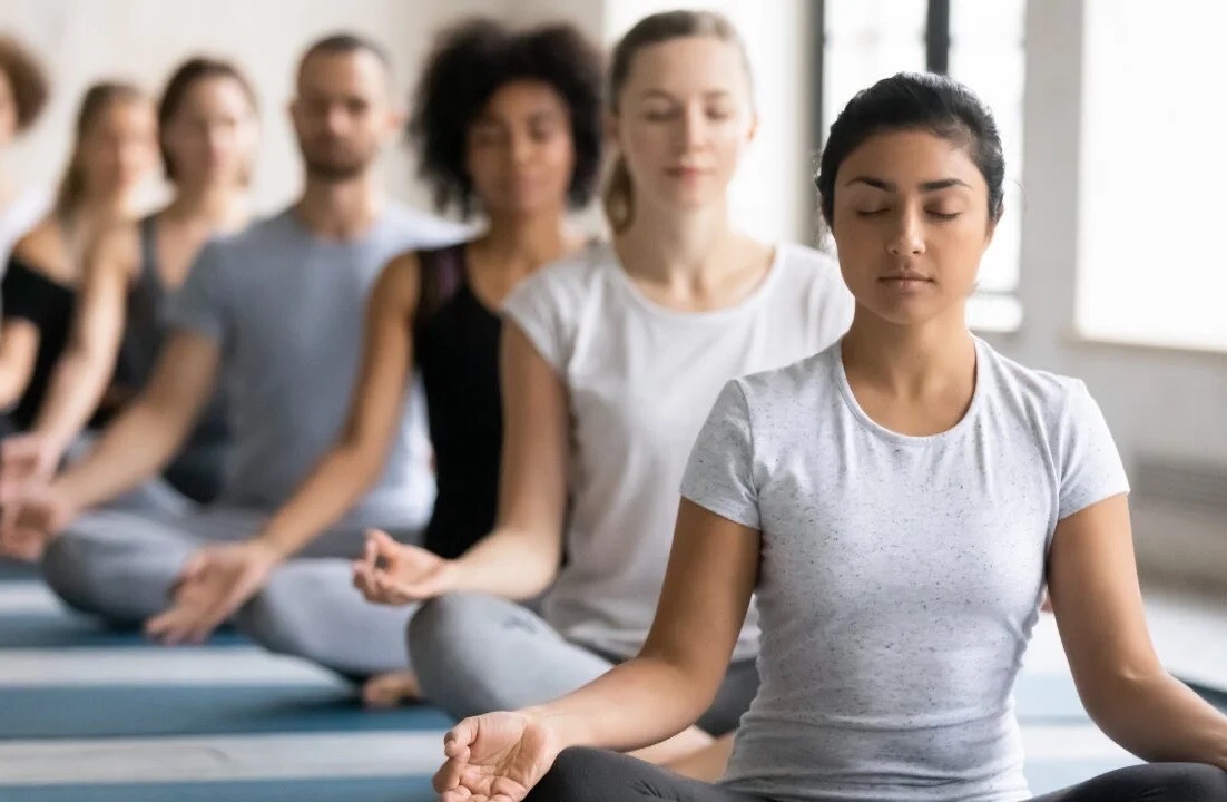 group of people meditating